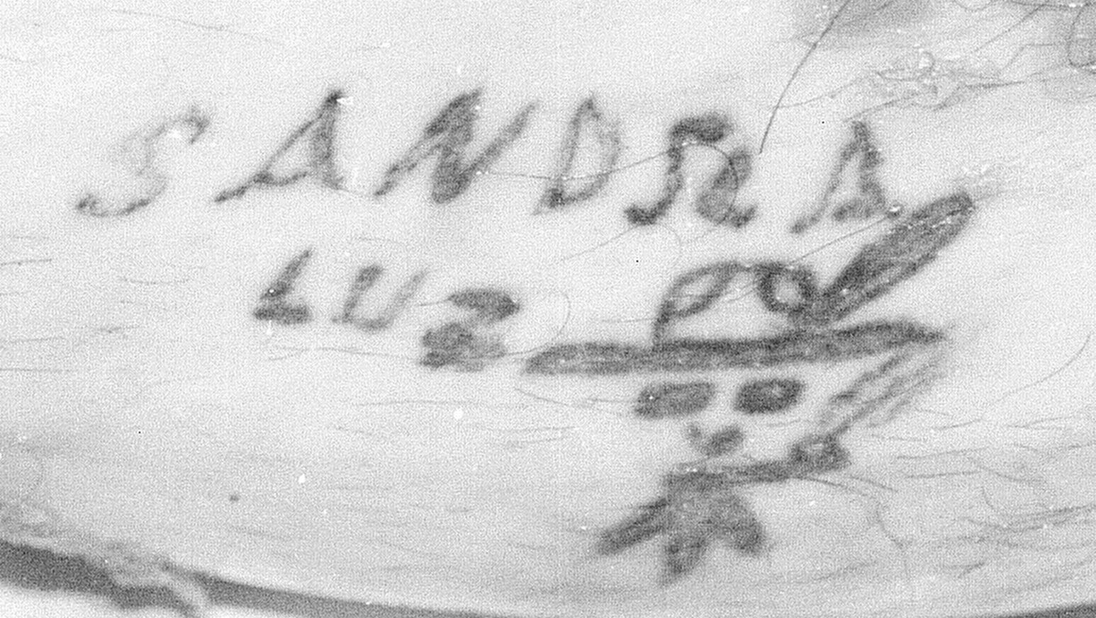 A tattoo on the body of an unidentified man found in the All-American Canal on April 2, 1993. Photo from John Doe Case #9312645