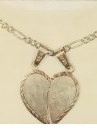 A locket found with the body of a Latino man in the open desert west of Winterhaven, CA, on August 6, 2000. Photo from John Doe Case #00-127.