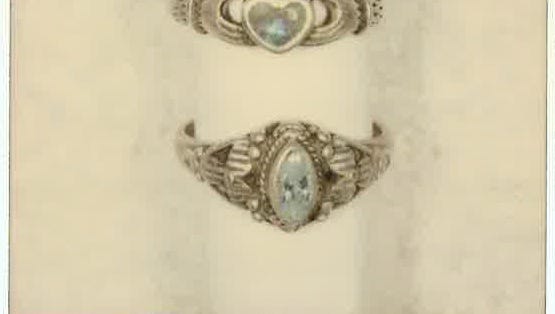 Two rings found with the body of a Latino man in the open desert west of Winterhaven, CA, on August 6, 2000. Photo from John Doe Case #00-127.